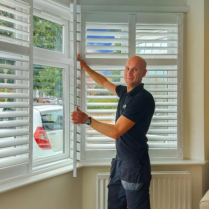 Team Member Fitting Shutters